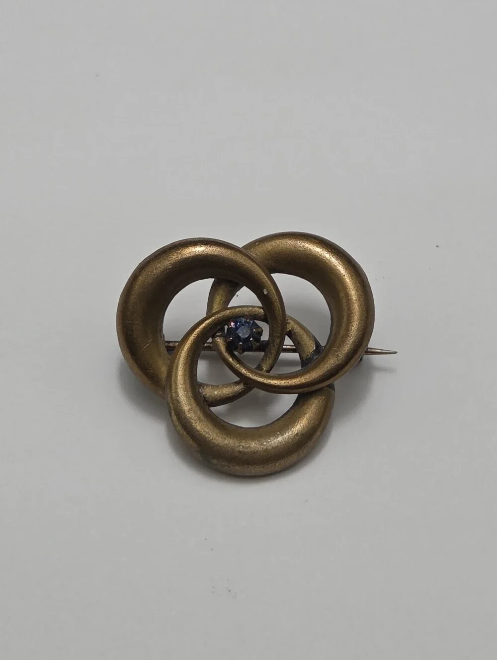 Antique 1900s Brass & Blue Stone Love Knot Brooch Pin